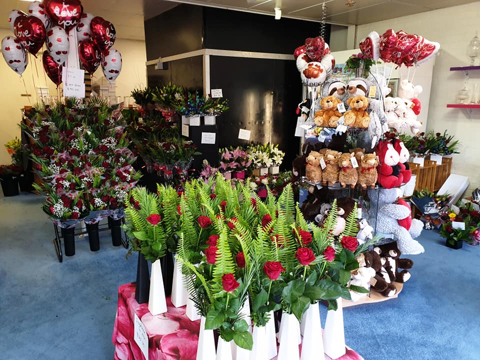 Single rose in bud vase Freckles Flowers