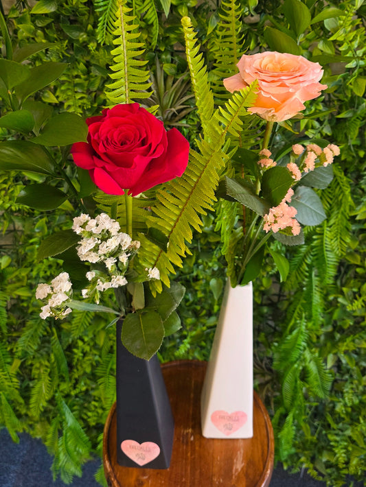 Single rose in bud vase
